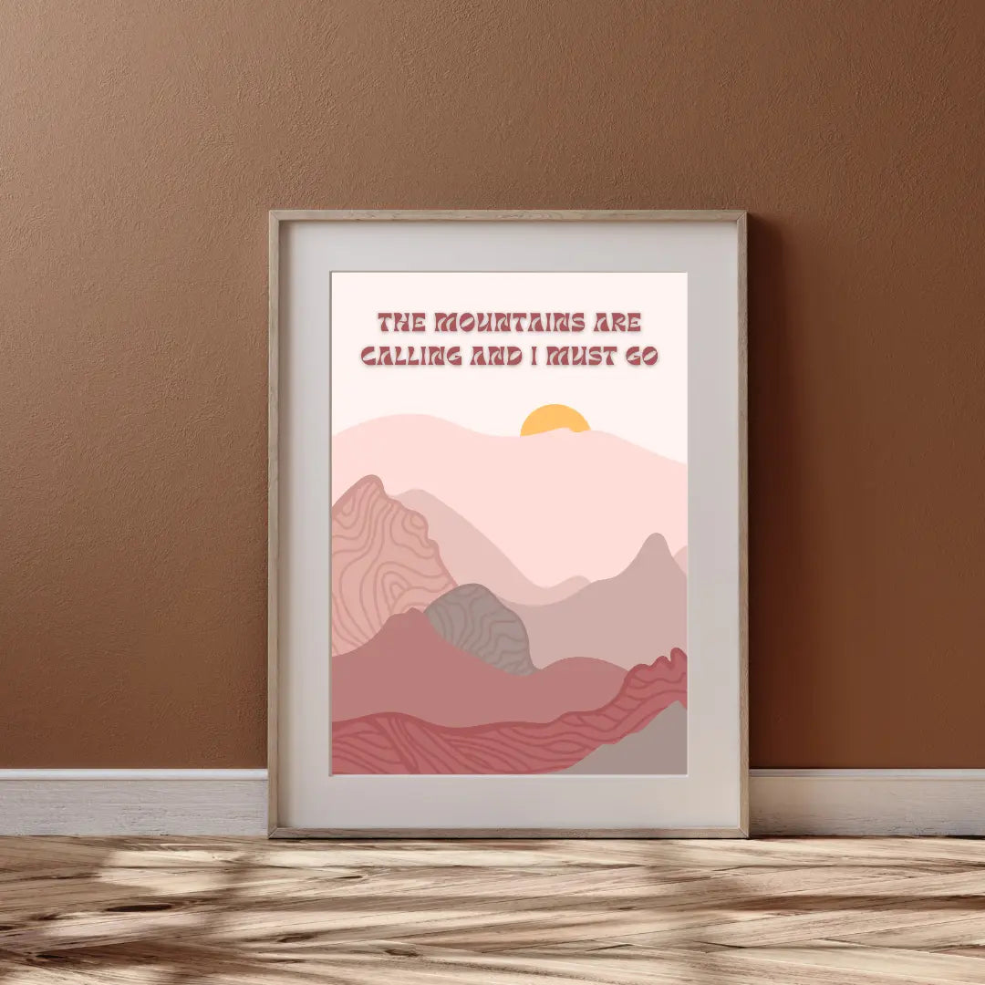 ForWalls.eu - Plakat Mountain Calling - Minimalist mountain landscape in warm pinks and reds with orange sun and text "The mountains are calling and I must go". - góry, minimalistyczny, natura, plakat