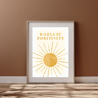 ForWalls.eu - Plakat Radiate Positivity - Minimalist poster with golden sunburst and "Radiate Positivity" text in bold uppercase on white background. - minimalistyczny, plakat, well-being