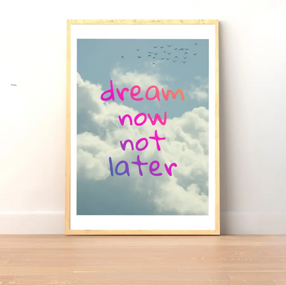 ForWalls.eu - Plakat Dream Now Not Later - Pink and purple "dream now not later" text over blue sky with fluffy clouds and flying birds, framed poster on floor. - plakat, typografia, well-being