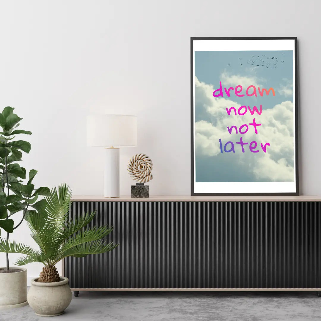 ForWalls.eu - Plakat Dream Now Not Later - Framed poster with blue sky and clouds background, bright pink handwritten text "dream now not later" in center. - plakat, typografia, well-being