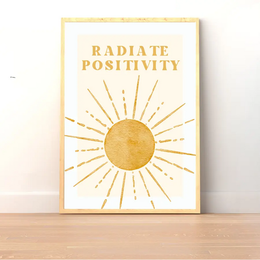ForWalls.eu - Plakat Radiate Positivity - Minimalist poster with golden sunburst design and bold uppercase text "Radiate Positivity" on white background. - minimalistyczny, plakat, well-being