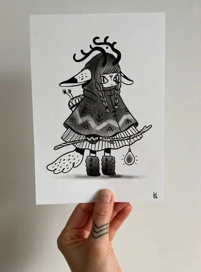 ForWalls.eu - Plakat Lightworker - Hand holding A5 black and white illustration poster of a girl in a cloak with antlers and boots on textured white paper. - export, Luiza Kwiatkowska, plakat, print